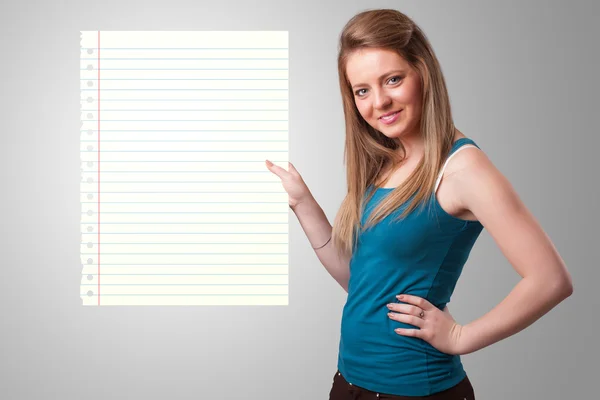 Young woman holding white paper copy space with diagonal lines — Stock Photo, Image