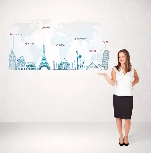 Business woman presenting map with famous cities and landmarks — Stock Photo, Image