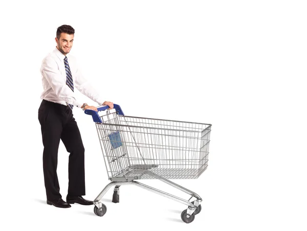 Businessman with shopping cart Stock Image