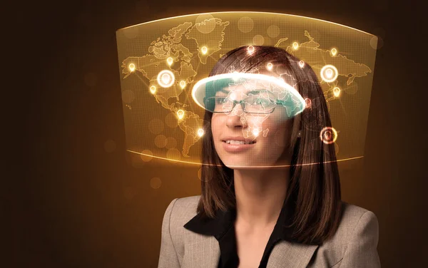 Young woman looking at futuristic social network map — Stock Photo, Image