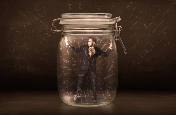 Businessman inside a jar with powerful hand drawn lines concept — Stock Photo, Image