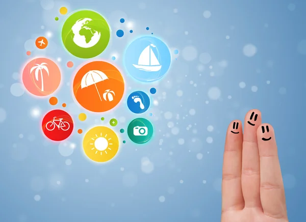 Cheerful finger smileys with colorful holiday travel bubble icon — Stock Photo, Image