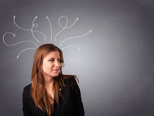 Young girl thinking with arrows overhead — Stock Photo, Image