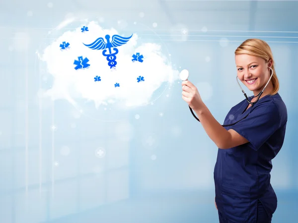 Joven médico con nube abstracta e iconos médicos — Foto de Stock