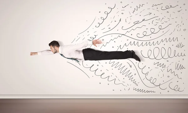 Деловой человек летит с нарисованными вручную линиями — стоковое фото
