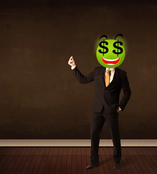 Man met dollarteken smiley gezicht — Stockfoto