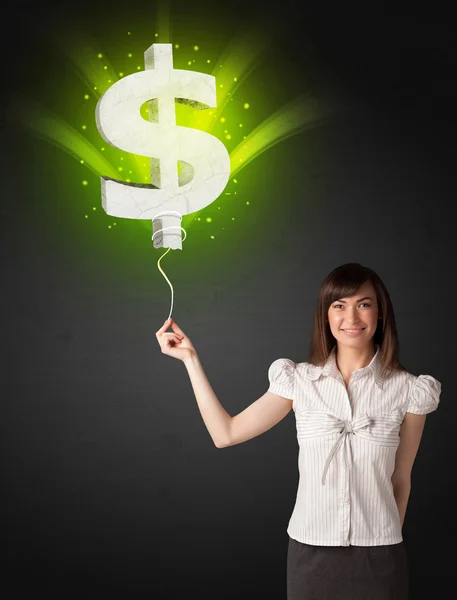 Businesswoman with a dollar sign balloon — Stock Photo, Image