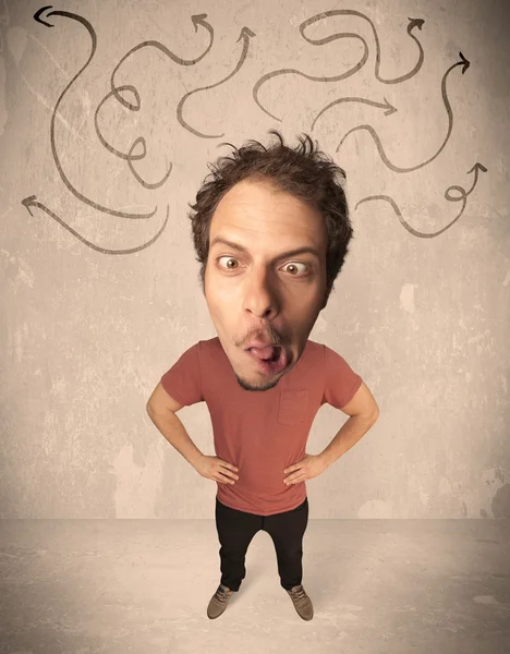 Big head person with arrows — Stock Photo, Image