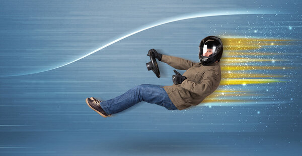 Young man driving in imaginary fast car with blurred lines 