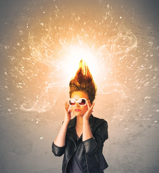 Young woman with energetic exploding red hair — Stock Photo, Image