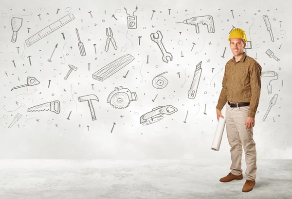 Construction worker planing with hand drawn tool icons — Stock Photo, Image