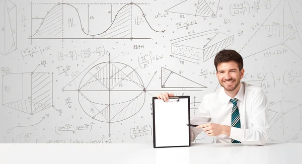 Businessman with business calculations background — Stock Photo, Image