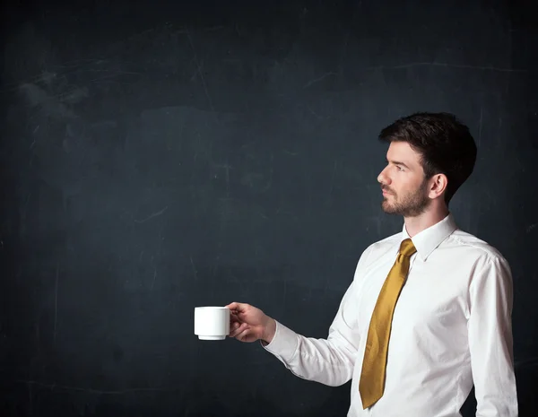 Geschäftsmann mit weißer Tasse — Stockfoto