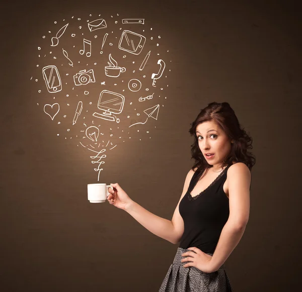 Businesswoman holding a white cup with social media icons — Stock Photo, Image