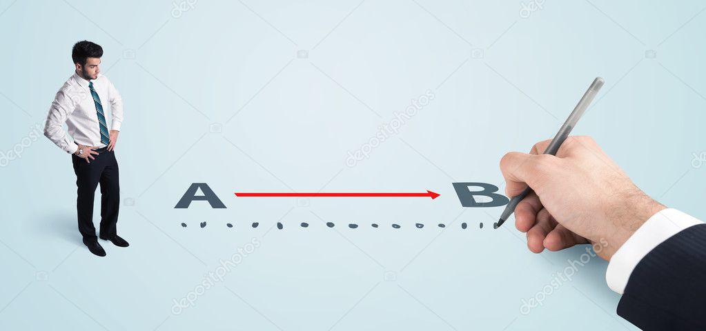 Businessman looking at red line from a to b drawn by hand