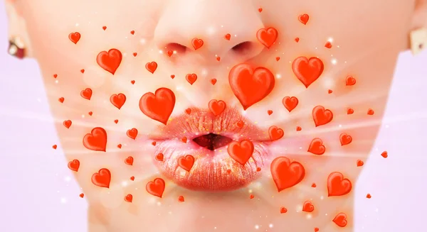 Pretty lady lips with lovely red hearts — Stock Photo, Image