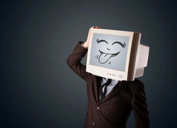 Glücklicher Geschäftsmann mit Computermonitor und Smiley-Gesicht — Stockfoto