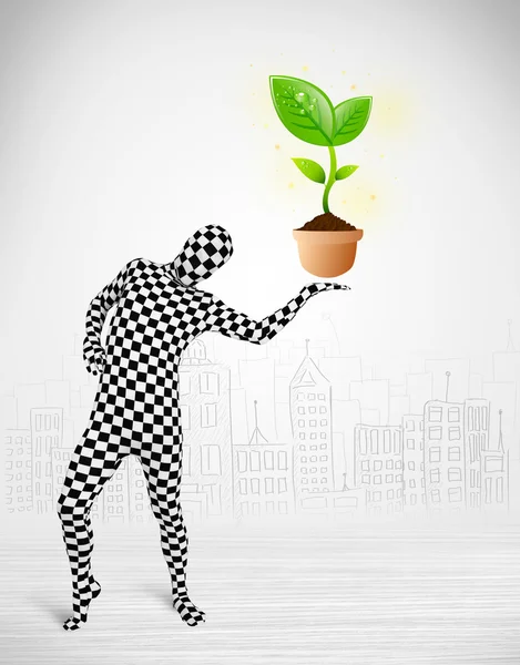 Man in full body suit with eco plant — Stock Photo, Image