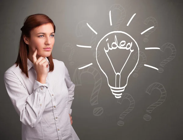 Young girl comming up with a light bubl idea sign — Stock Photo, Image