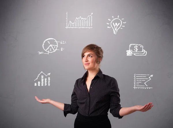 Beautiful young woman juggling with statistics and graphs — Stock Photo, Image