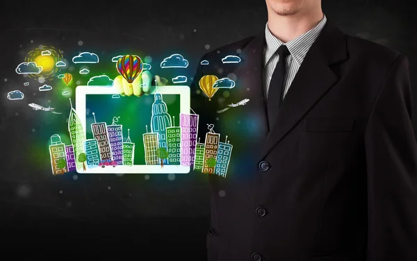 Young person showing tablet with hand drawn cityscape — Stock Photo, Image