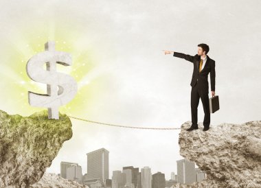 Bir dolar işareti ile rock dağda işadamı