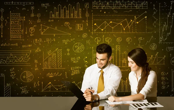 Business couple with diagram background — Stock Photo, Image