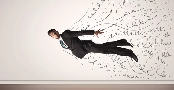 Business man flying with hand drawn lines comming out — Stock Photo, Image