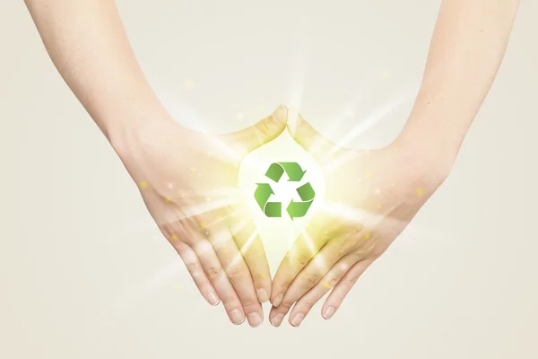 Hands creating a form with recycling sign — Stock Photo, Image