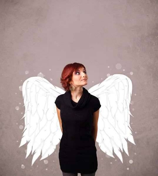 Cute girl with angel illustrated wings — Stock Photo, Image