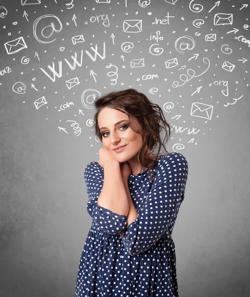 Pretty young girl with abstract white media icon doodles — Stock Photo, Image