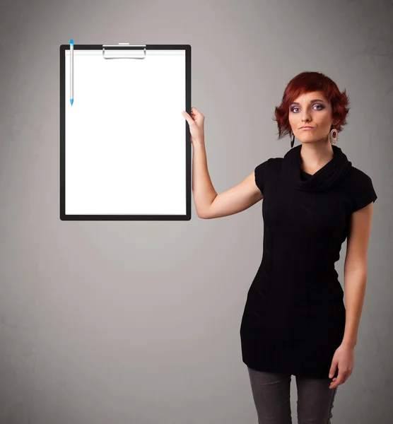 Young girl holding black folder with white sheet copy space — Stock Photo, Image