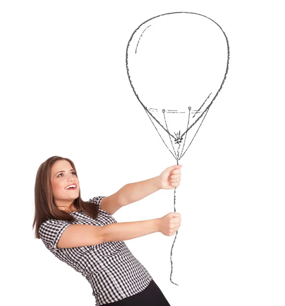 Ładna kobieta trzyma balon rysunek — Zdjęcie stockowe