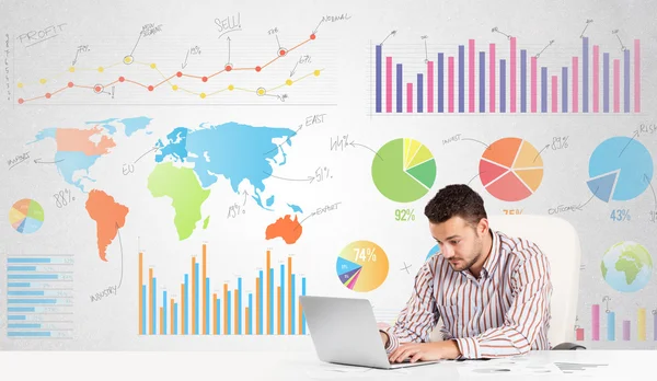 Affärsman med färgglada diagram — Stockfoto