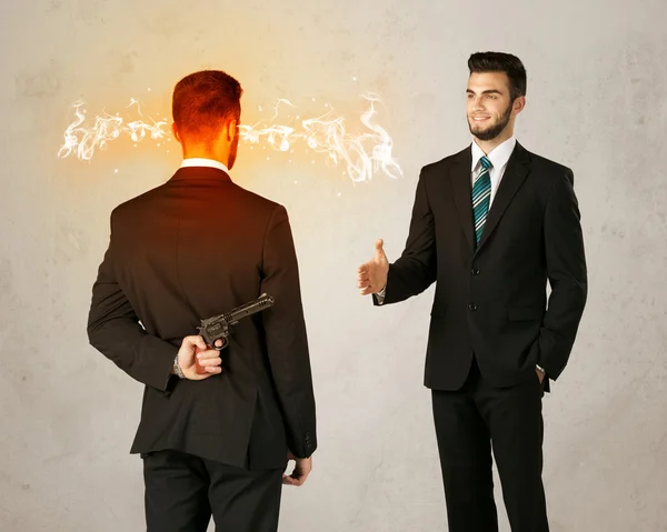 Angry businessman with weapon — Stock Photo, Image