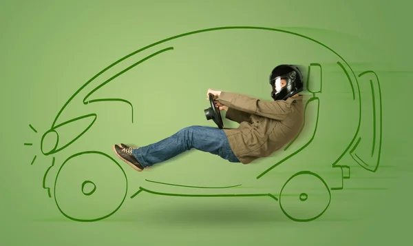 Man drives an eco friendy electric hand drawn car — Stock Photo, Image