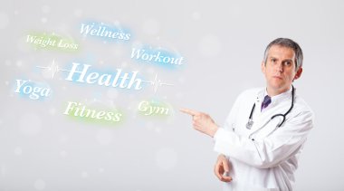 Sağlık ve fitness wor koleksiyonuna işaret eden klinik doktoru
