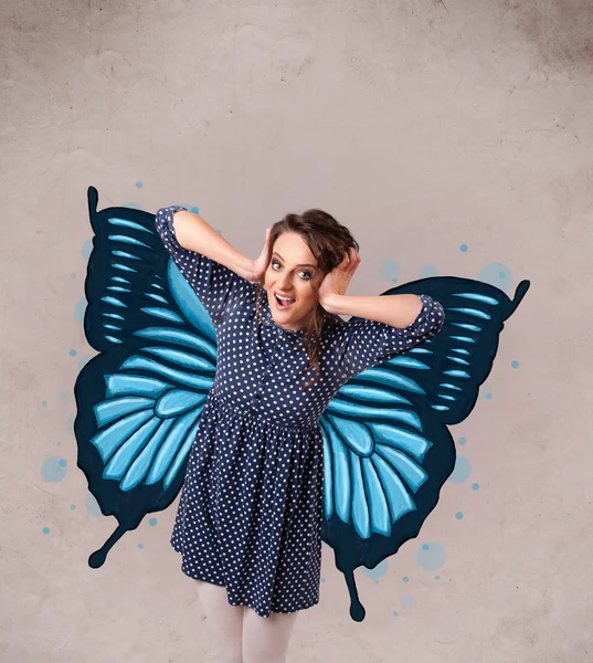 Young girl with butterfly blue illustration on the back — Stock Photo, Image