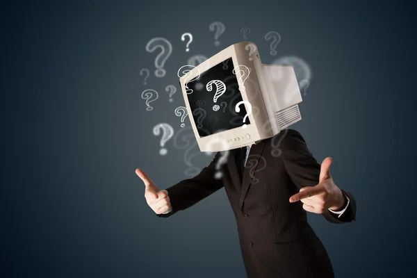 コンピュータモニターの頭と質問のマークを持つビジネスマン — ストック写真