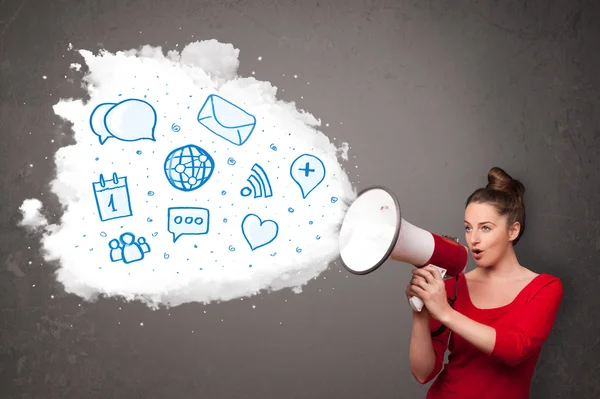 Woman shouting into loudspeaker and modern blue icons and symbol — Stock Photo, Image