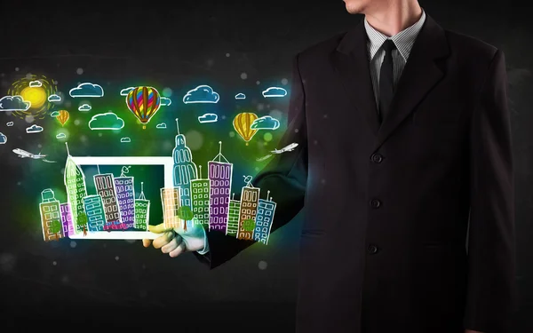 Young person showing tablet with hand drawn cityscape — Stock Photo, Image