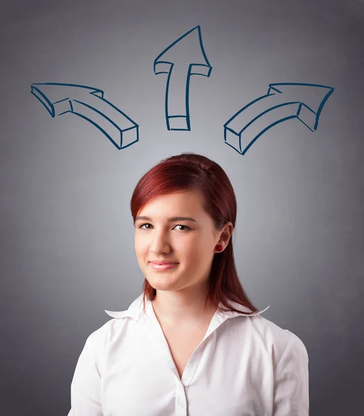 Pretty lady thinking with arrows overhead — Stock Photo, Image