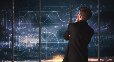 İş adamı iş grafikleri çiziyor