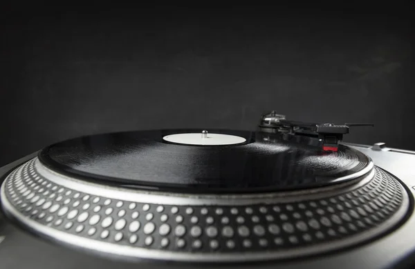 Turntable playing vinyl close up with needle on the record — Stock Photo, Image