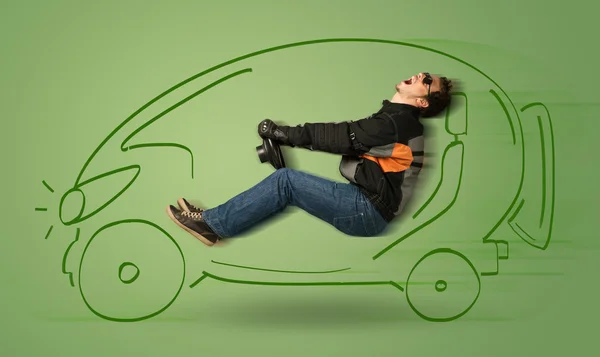 El hombre conduce un coche eléctrico ecológico dibujado a mano —  Fotos de Stock