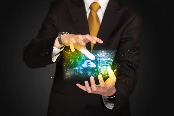 Businessman holding data cloud — Stock Photo, Image