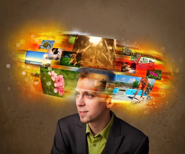 Man with colorful glowing photo memories concept — Stock Photo, Image