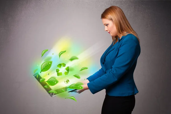 Casual woman holding notebook with recycle and environmental sym — Stock Photo, Image