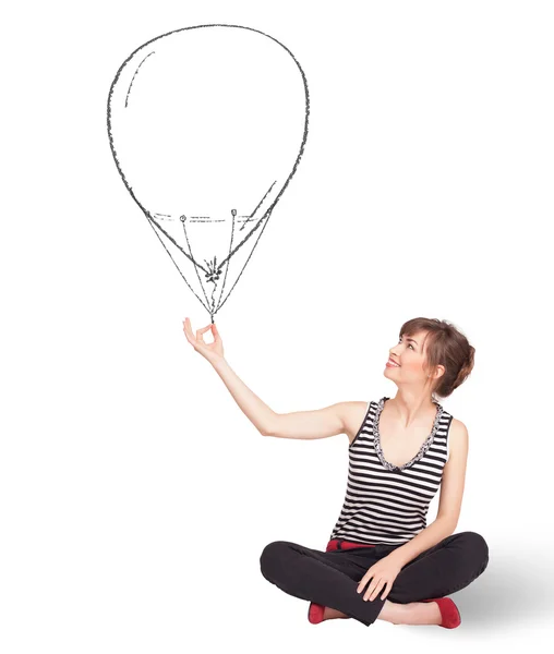 Hübsche Frau mit Luftballon-Zeichnung — Stockfoto
