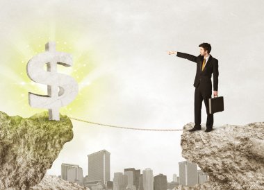 Bir dolar işareti ile rock dağda işadamı